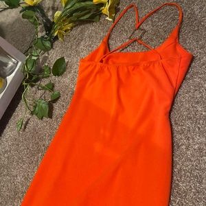 Orange mini dress, criss cross back, gold diamond
